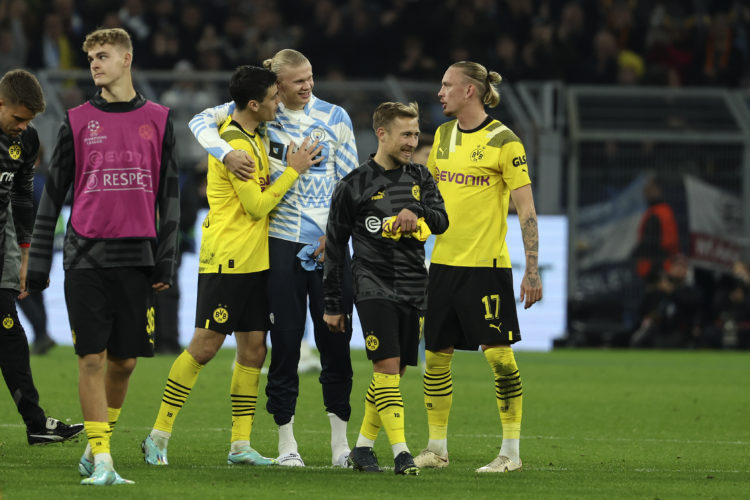 Borussia Dortmund, Erling Haaland of Manchester City, Felix Passlack of Borussia Dortmund and Marius Wolf of Borussia Dortmund after the Match after the UEFA Champions League group G match between Borussia Dortmund and Manchester City at Signal Iduna Park on October 25, 2022 in Dortmund, Germany. (Photo by Joachim Bywaletz/DeFodi Images via Getty Images
