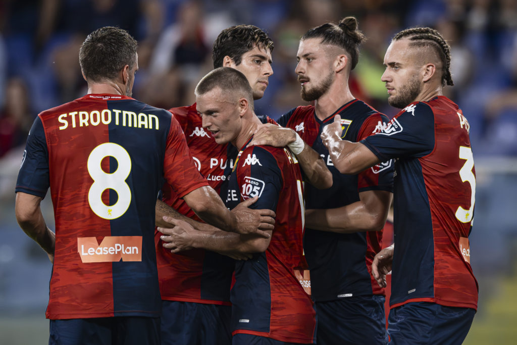 Albert Gudmundsson (2nd from L) of Genoa CFC celebrates with